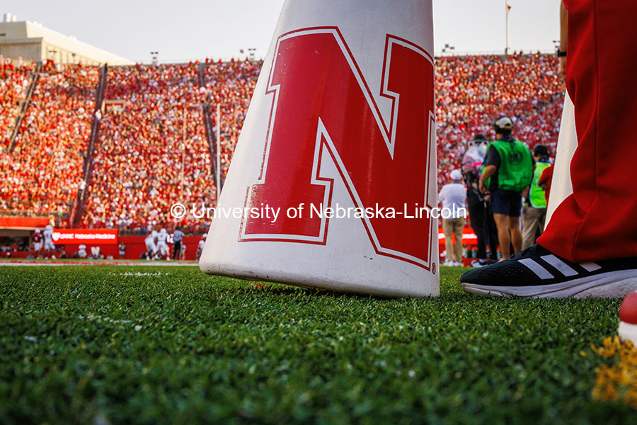 Closeup of the cheer squad’s megaphone on the turf at the Nebraska vs Rutgers homecoming football game. October 5, 2024. Photo by Kristen Labadie / University Communication.