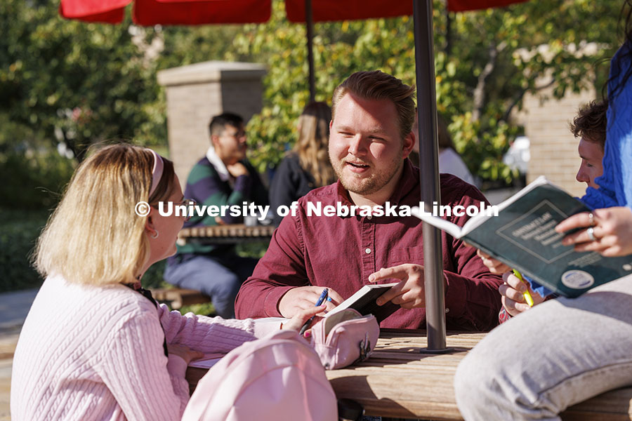 Law students studying outside. College of Law photoshoot. October 10, 2024. Photo by Craig Chandler / University Communication and Marketing.