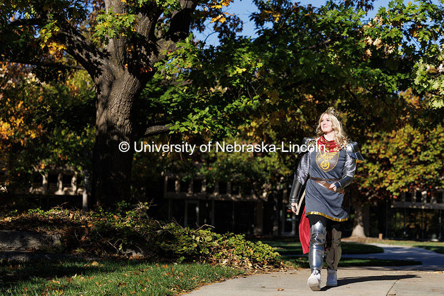 Junior geology major Nikki Elm walks on campus dressed as King Arthur for Halloween. Halloween on campus. October 31, 2024. Photo by Jordan Opp / University Communication and Marketing.