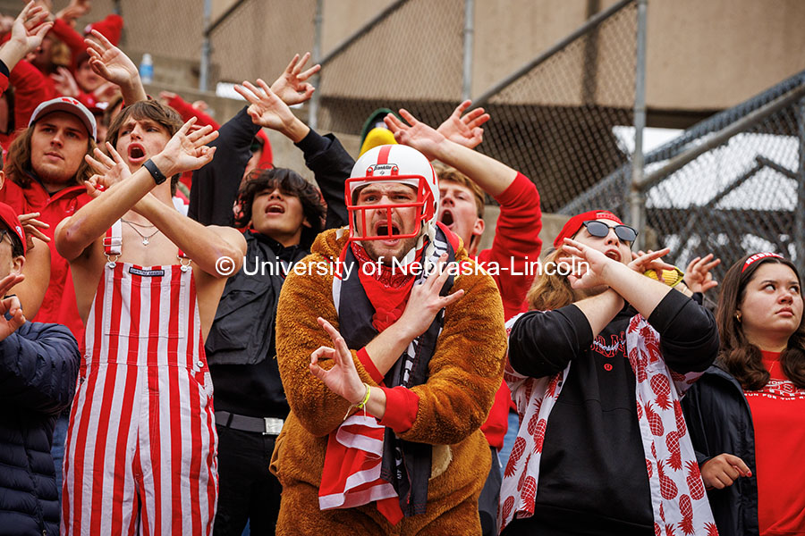 Denis Mcginty, a senior Advertising and Public Relations major, throws the bones at the Nebraska vs UCLA football game. November 2, 2024. Photo by Kristen Labadie / University Communication.