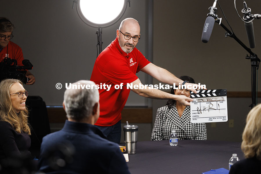 Aaron Nix of University Communication and Marketing claps the start of the video session. NHRI Leadership Mentoring round table during the group’s 75th anniversary meetings. November 8, 2024. Photo by Craig Chandler / University Communication.