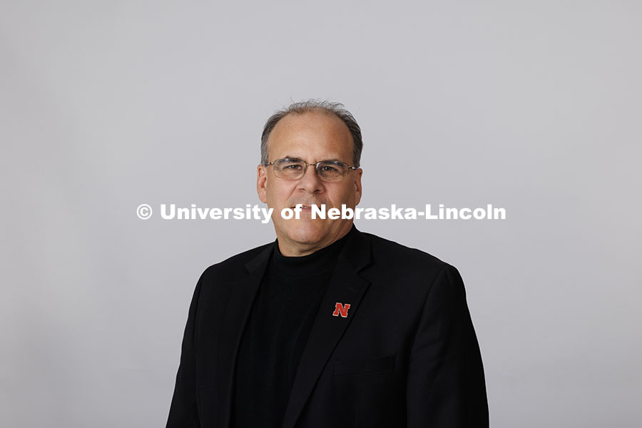 Studio portrait of Steve Kolbe, Associate Professor, Johnny Carson School of Theatre and Film. November 14, 2024. Photo by Jordan Opp / University Communication and Marketing.