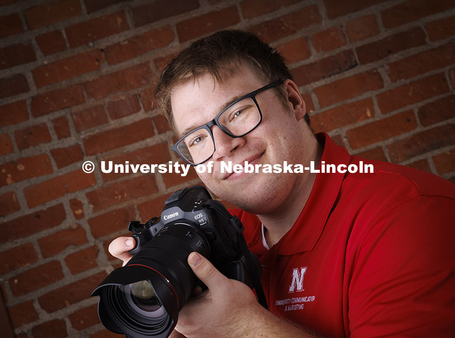 Studio portrait of Jordan Opp, Communications and Marketing Photographer, University Communication and Marketing. November 18, 2024. Photo by Craig Chandler / University Communication.