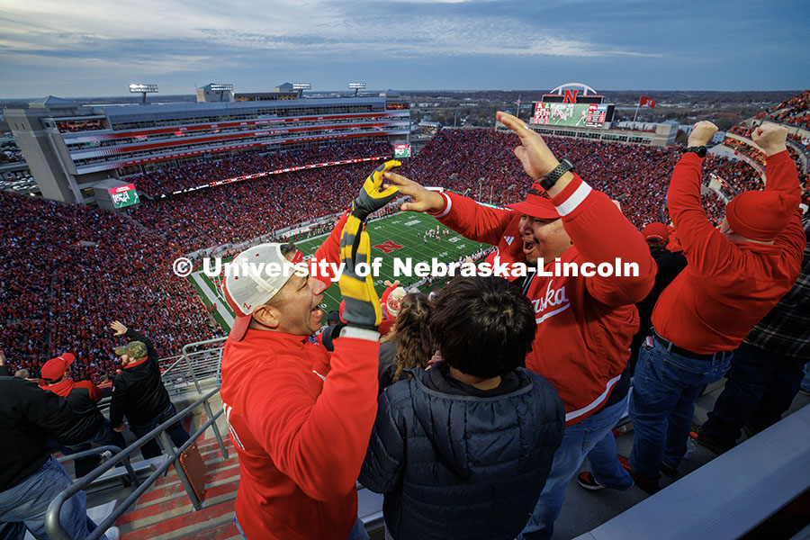 Cruz Longoria (left) high-fives Nathaniel Kage after Nebraska stops Wisconsin on fourth down during the third quarter. Nebraska vs. Wisconsin football game. November 23, 2024. Photo by Jordan Opp / University Communication and Marketing.