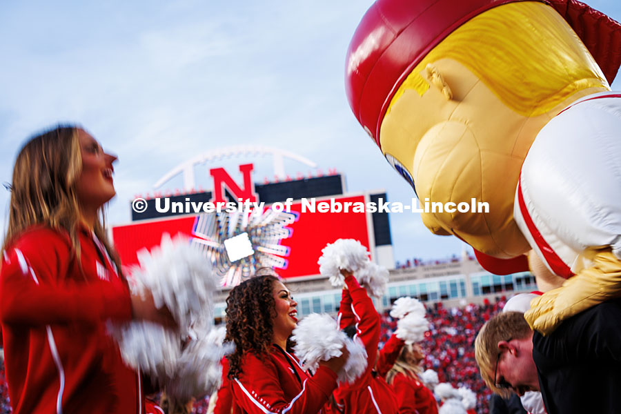 Jada Lau, a Junior Advertising and Public Relations major and Husker Scarlet interacts with Lil’ Red at the Huskers vs. Wisconsin Football game. November 23, 2024. Photo by Kristen Labadie / University Communication.