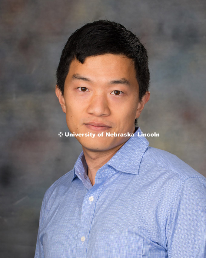 Studio portrait of , New Faculty Photo Shoot, August 19, 2015. 