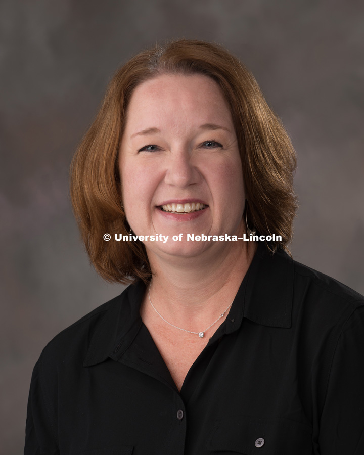 Studio portrait of Linda Hellbusch, Administrative Associate for Plant Health. October 20, 2016. 