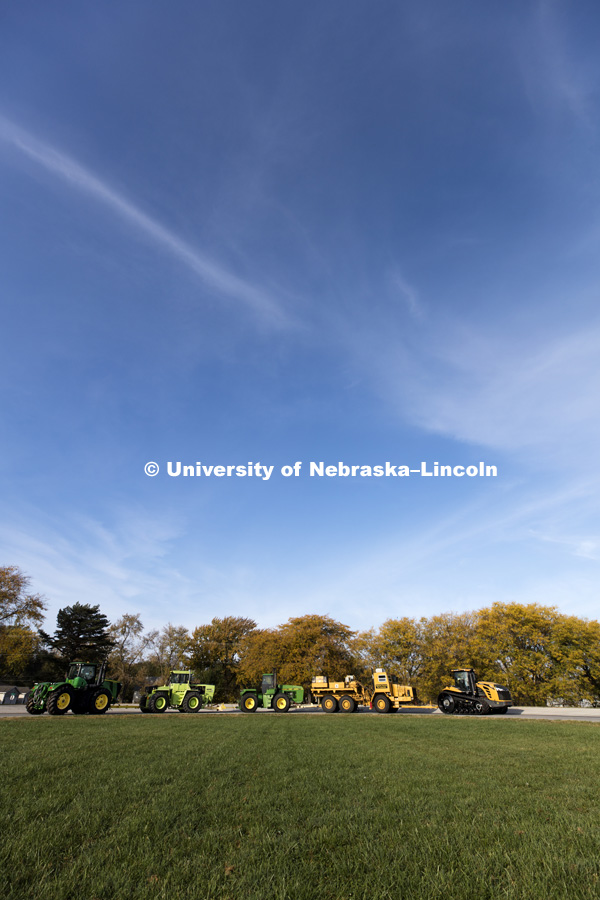 A Challenger tractor being tested pulls the test car and multiple tractors being used to provide var