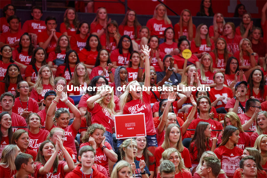 New students decked out in their Husker reds fill the seats in the Bob Devaney Sports Center at New 