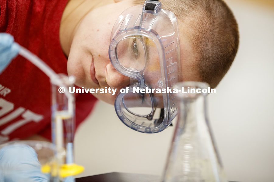 Kayla Kremke measures solutions in the Chem 113 lab. Chemistry Lab in Hamilton Hall. November 7, 201