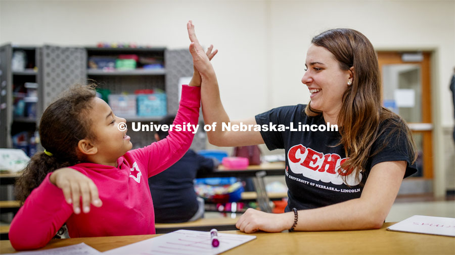 Samantha Wolff, a senior secondary education major, works with Hartley Elementary students during th