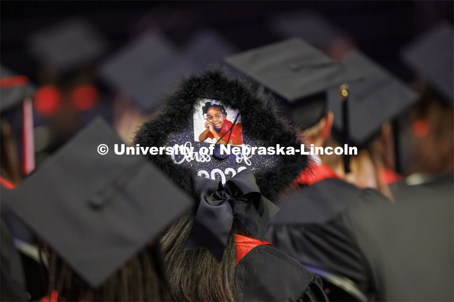Dayana Houston decorated her mortar board with her three-year-old self. Nebraska grants about 600 de