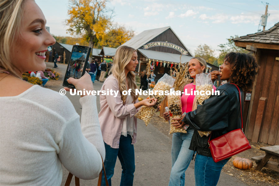 Husker Cheer Squad enjoy some popcorn at Roca Berry Farm. About Lincoln at Roca Berry Farm. October 