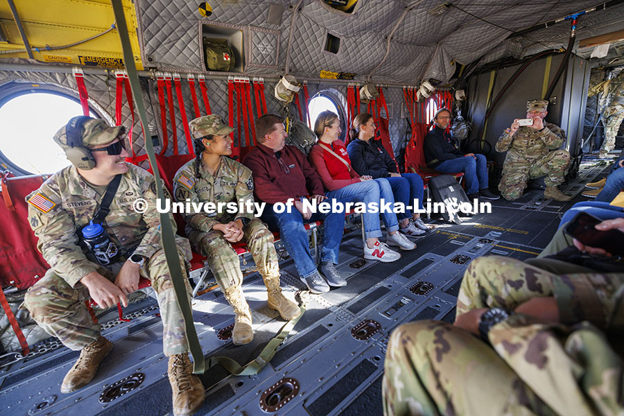 Lt. Col. Tom Slykhuis takes a photo of the cadets (from left) Colten Stevens and Alyssa Batista, and