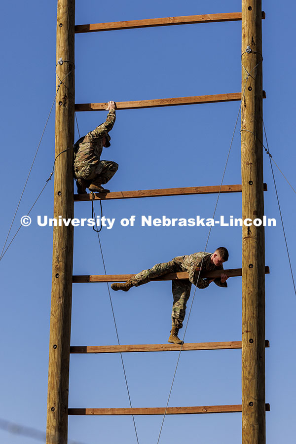 Cadets work at the obstacle course at the Mead training grounds. ROTC cadets on fall exercise. Octob