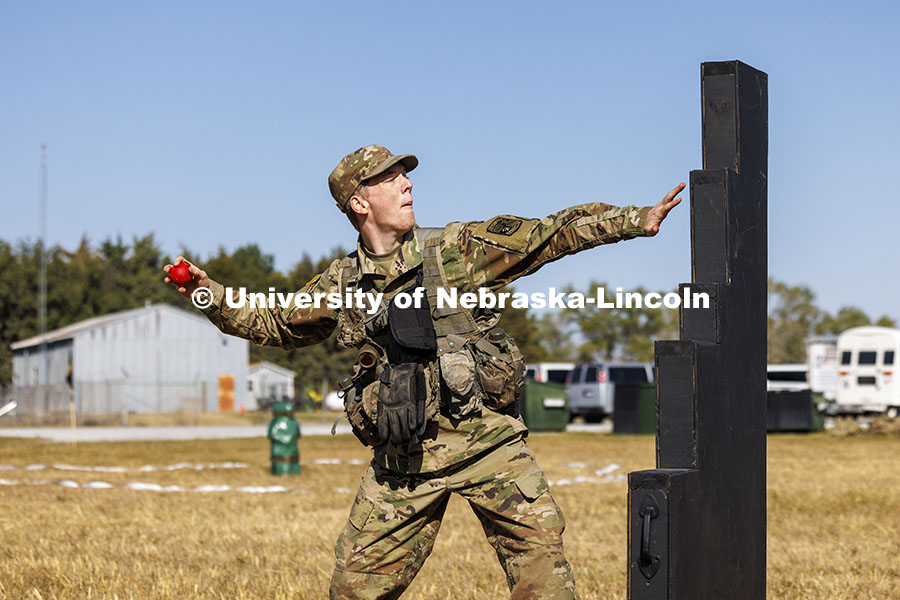 Charles Freivogel, a freshman from Omaha, throws a practice grenade during training. ROTC cadets on 