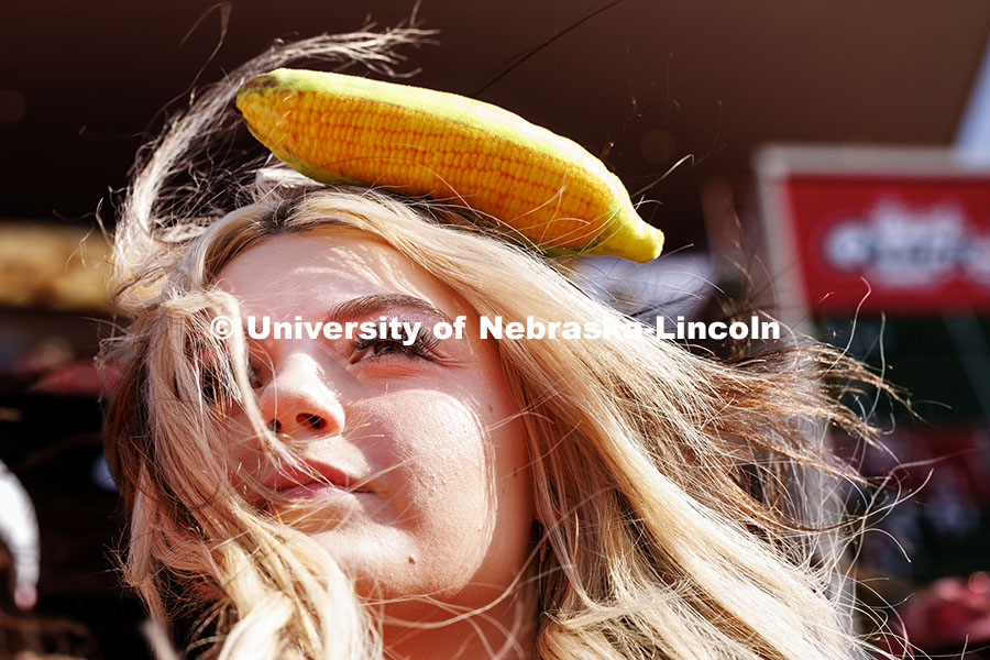 Madison Boyden wore a fabric ear of corn clipped in her hair. Nebraska vs Rutgers football game. Hom