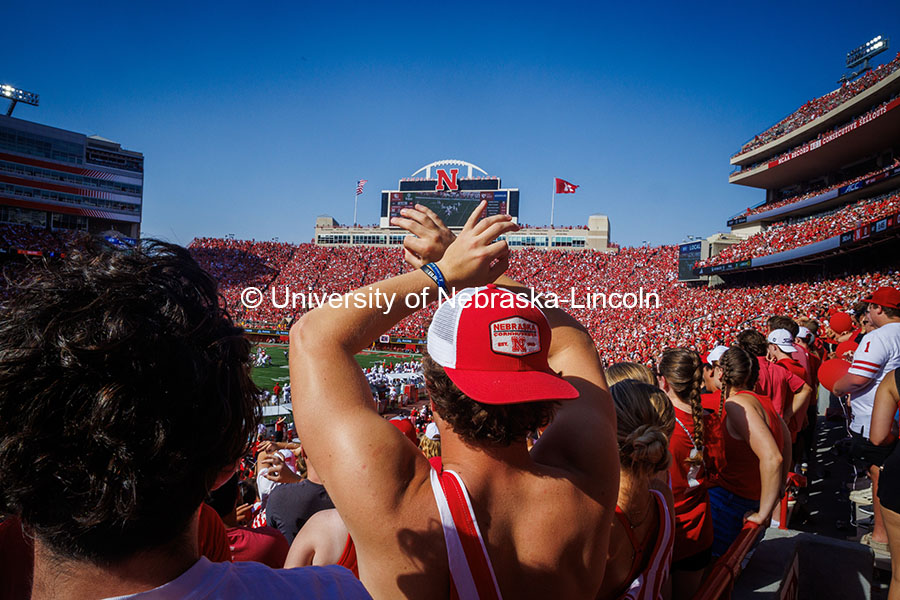 Carter Coulombe, a freshman Business Administration major, “throwing the bones” Nebraska vs Rutg