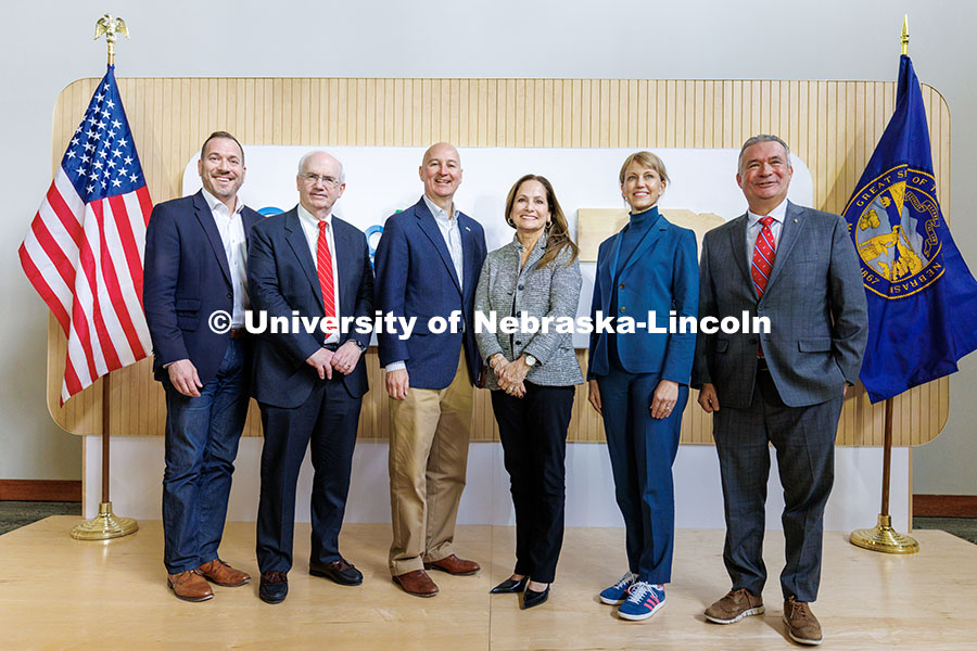 President Jeffrey Gold, second from left, poses with others for a photo following Google’s announc