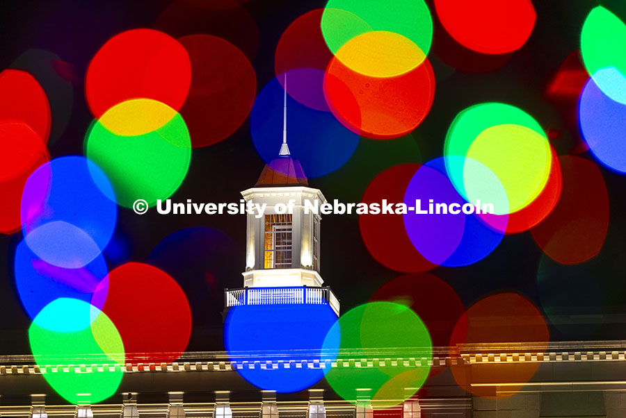 Love Library cupola framed by holiday lights in a multiple exposure. December 20, 2024. 