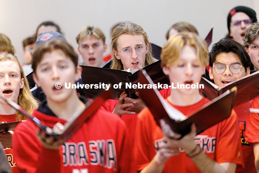 Members of the UNL Choir sing during rehearsal inside the Rockville Hilton Hotel. Inauguration choir