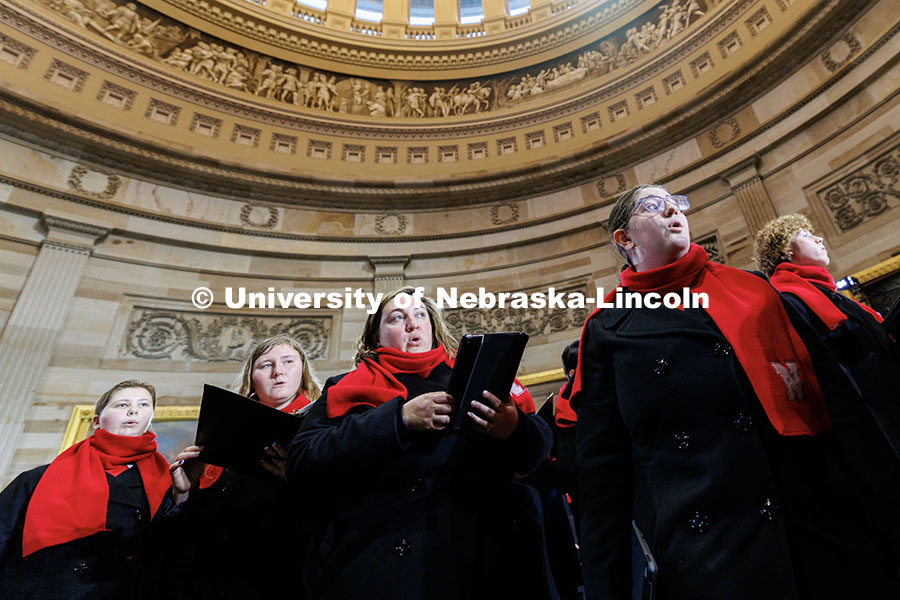 Analee Adams (right), a freshman secondary education major, sings "One Voice" during the University 