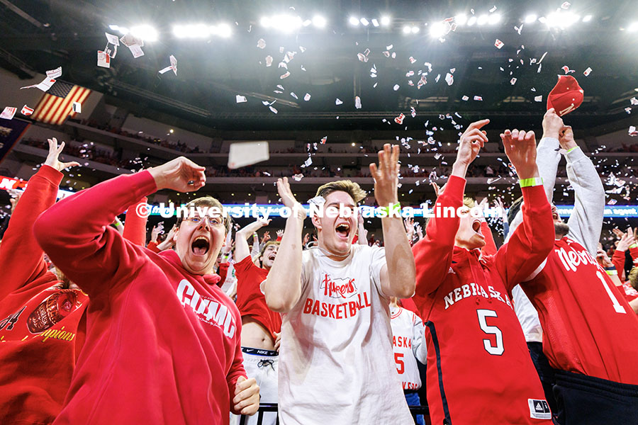 Max Meyer, from left, Logan Eby, and Ryan Eickhoff celebrate as the Nebraska men’s basketball team