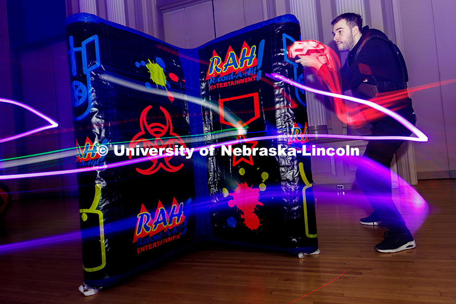 250131_Tag_and_Karaoke_005.jpg Mark Malmay aims at an opponent during a round of laser tag inside the Centennial Room of the Nebras
