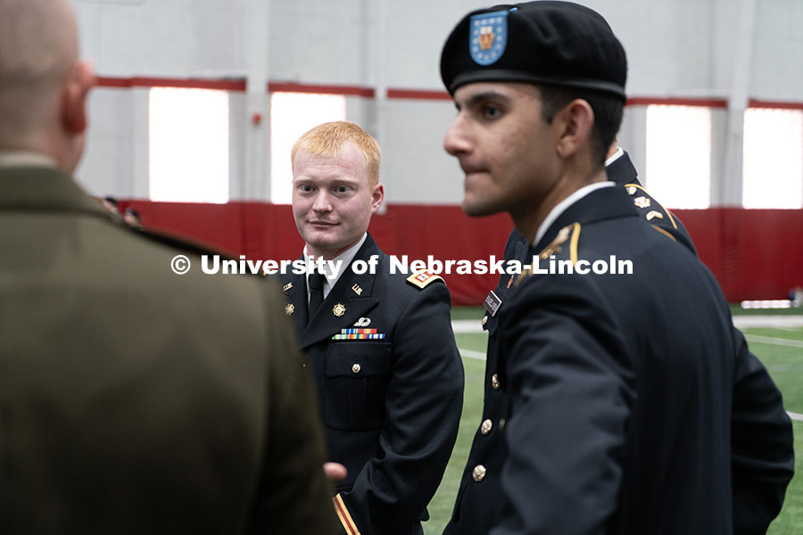 250417_ROTC_Review_07.jpg ROTC students chat before the ceremony begins. Joint Service Chancellor’s Review of the ROTC Cadet