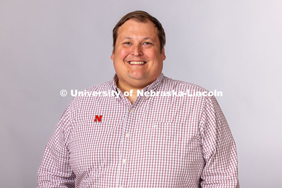 250501_Joey_Lynch.jpg Studio portrait of Joey Lynch, Director of University Advising for the Explore Center. May 1, 2025.