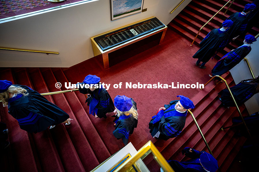 250503_Law_Commencement_0048.jpg Graduates climb the stairs into the Lied Center prior to the graduation ceremony. 2025 College of La