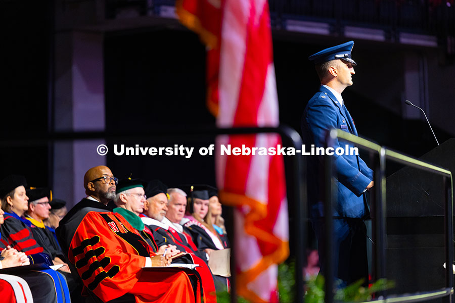 250517_Commencement_1706.jpg Lt. Col. Philip Garito, commander of Air Force Reserve Officer Training Corps, recognizes students i