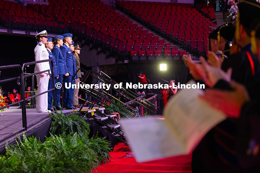 250517_Commencement_1770.jpg Students and faculty clap for ROTC students who gave their Oath of Office during the morning commenc