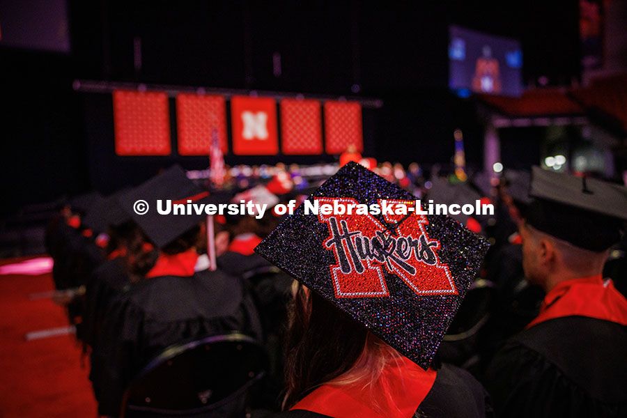 250517_Commencement_0602.jpg A decorated Huskers-themed grad cap worn by a graduating senior during the May 2025 Commencement Und