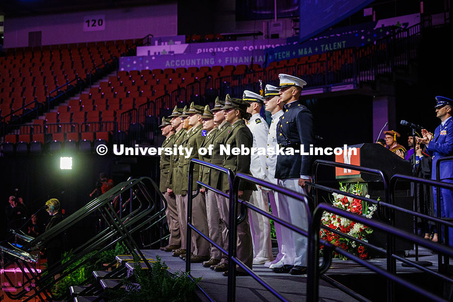 250517_Commencement_2201.jpg Graduating seniors of the ROTC stand on stage to be commissioned into the military post-graduation.
