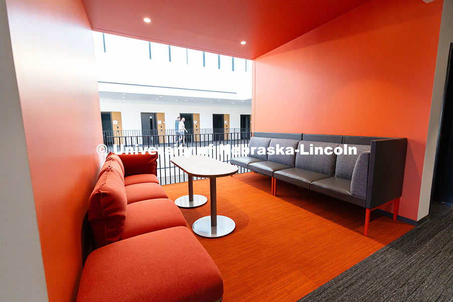 250522_FPA_8734.jpg Couches line an alcove overlooking the central lobby of the new Hixson-Lied College of Fine and Perf