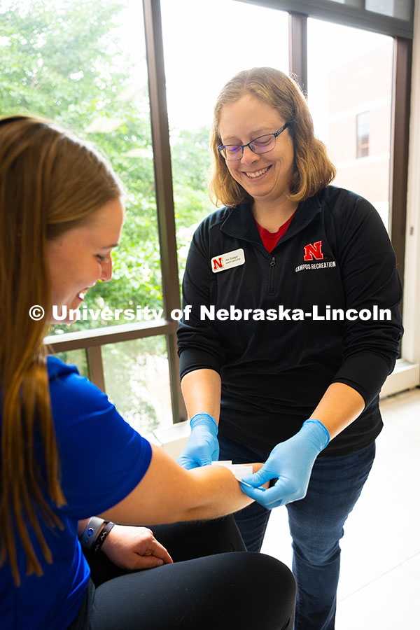 250606_Jen_Krueger_9670.jpg Jen Krueger, Senior Coordinator for Injury Prevention and Care, smiles at Kelci Davis, one of her st