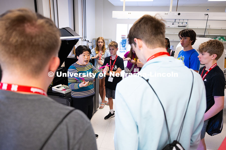 250610_Big_Red_Camps_0009.jpg Wen Qian, Associate Professor in the College of Engineering, talks about 3D printing with middle- an