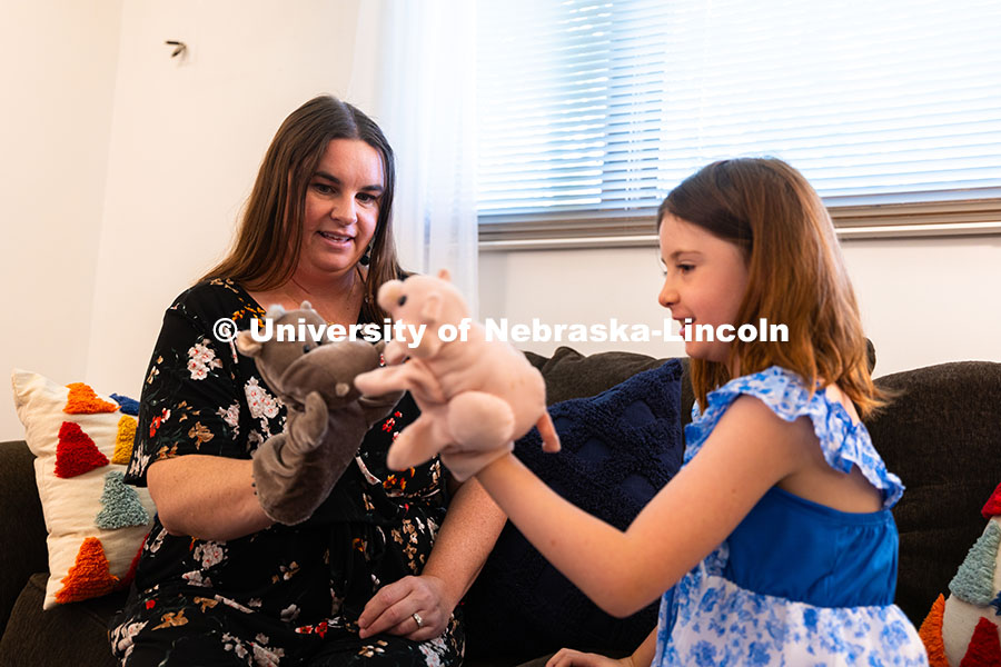 250616_Family_Clinic_0441.jpg Jamie Buhrman, a first-year graduate student in Child, Youth and Family Studies, uses puppets to pla