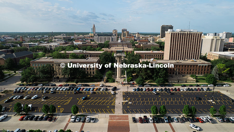250623_Mueller_0364.jpg Wide shot of UNL city campus and downtown Lincoln looking south. Construction workers stand on scaff