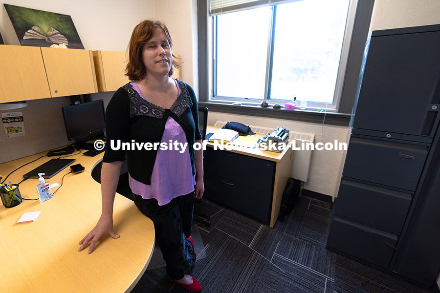 250617_Kelly_Coleman_0615.jpg Kelly Coleman stands in her office in Louise Pound Hall, where she works in Services for Students wi