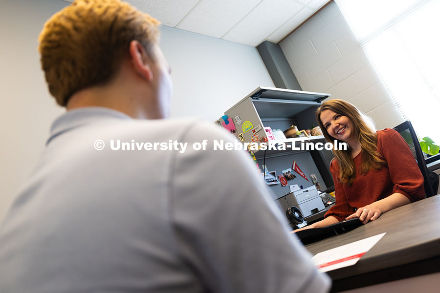 Meredith Cain, Academic Navigator for the College of Arts and Sciences, listens to Jack Hibbs, a sen