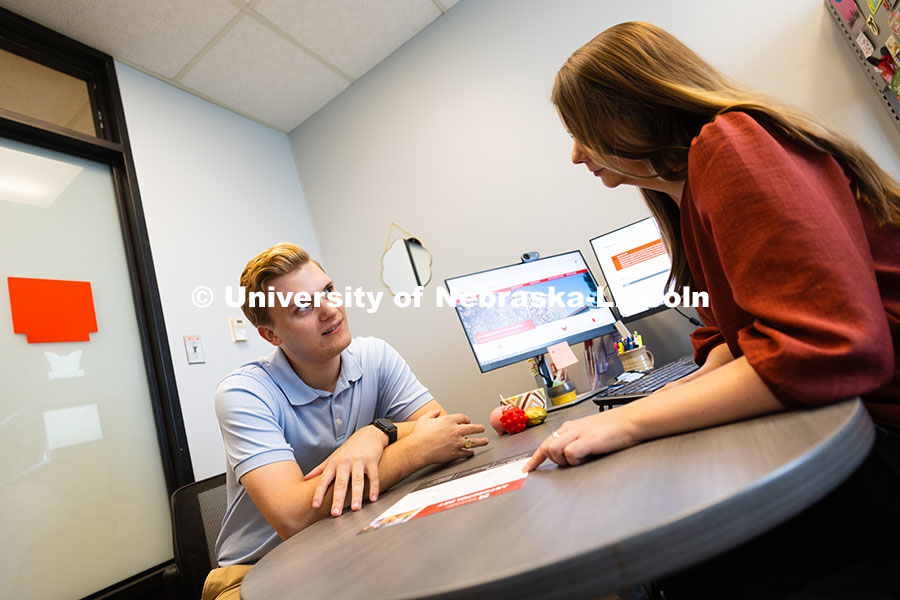 Meredith Cain, Academic Navigator for the College of Arts and Sciences, speaks with Jack Hibbs, a se