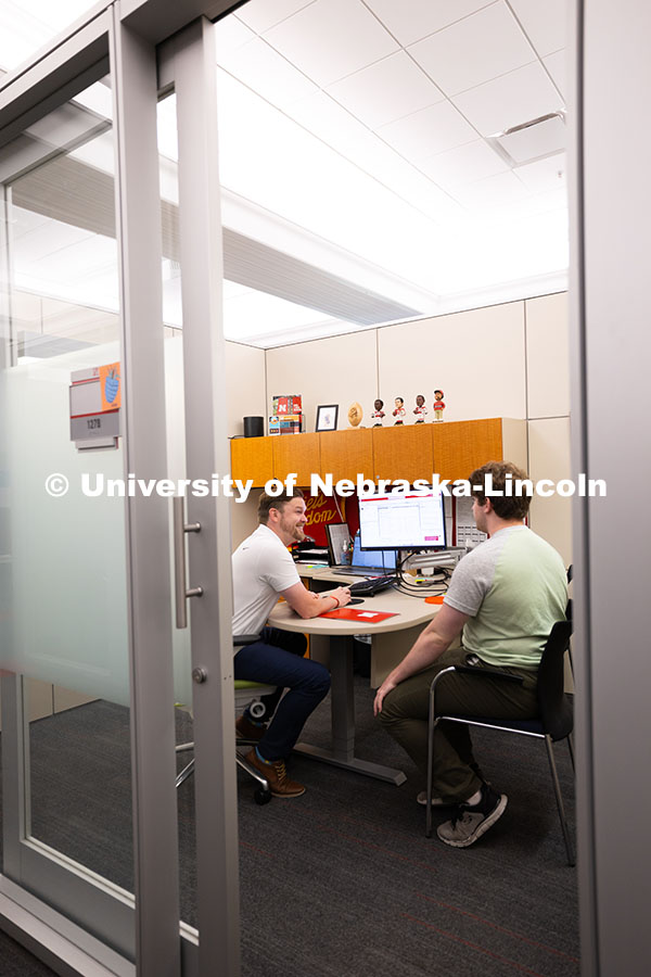 250624_Navigators_0989.jpg Adam Christiansen, Academic Navigator in the Explore Center, speaks with Jacob Behnk, a senior study