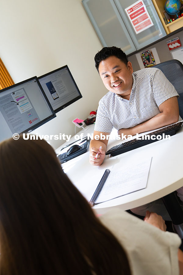 250625_CAST_Team_1758.jpg Donny Bui, an academic success coach in the Center for Academic Success and Transition, meets with K