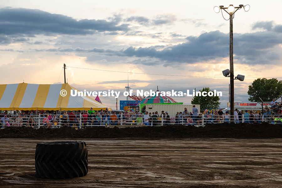 Tractors pulled graders around the Polk County Fairgrounds arena before finals for Figure 8 Racing T
