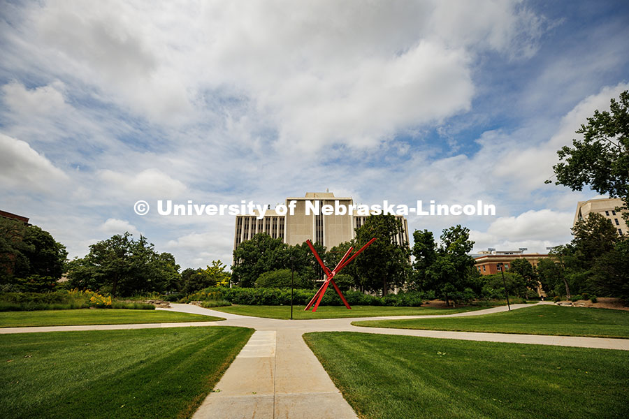 250716_City_Campus_484.jpg Five sidewalks intersect near the Old Glory sculpture on City Campus in the summertime. Summer on Ci