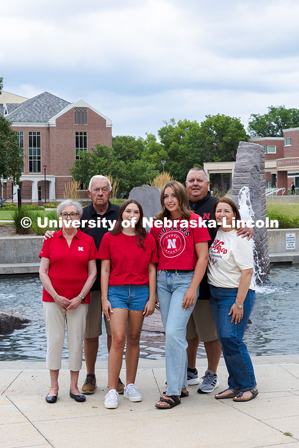 250716_PSA_Haring_2903.jpg Sisters Madison and Lauren Haring pose with their family in front of Broyhill Fountain. The Haring f