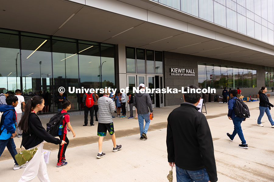 250523_Science_Olympiad_9115.jpg Competitors, coaches and volunteers walk into Kiewit Hall on the University of Nebraska–Lincoln ca