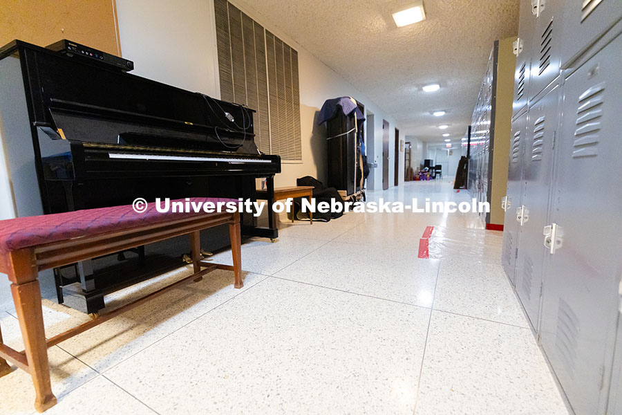 Pianos line one wall in the basement of the old Westbrook Music Building before being moved to the n